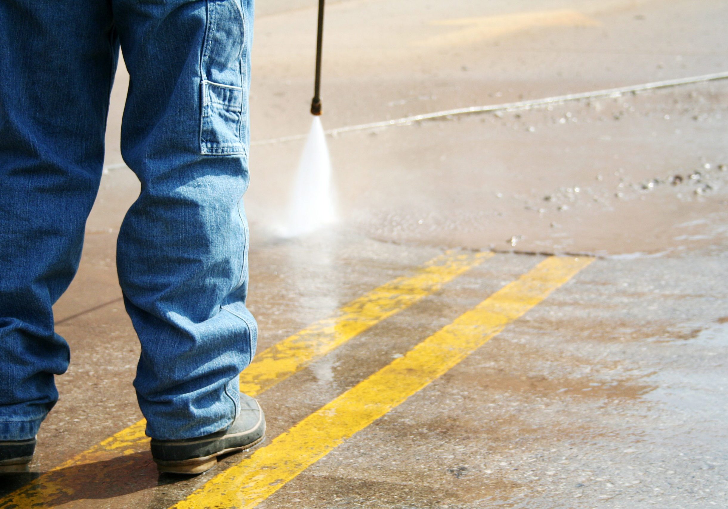 powerwashing the parking lot and cleaning the stripes